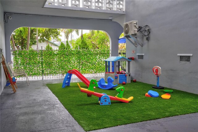 1818 Rodman St Unit 2E, Hollywood, FL 33020 - view of jungle gym featuring a cooling unit