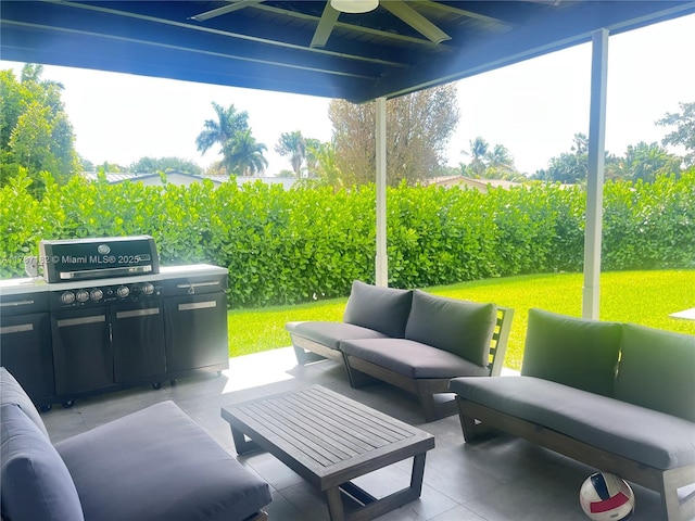view of patio with a ceiling fan, outdoor lounge area, and a grill