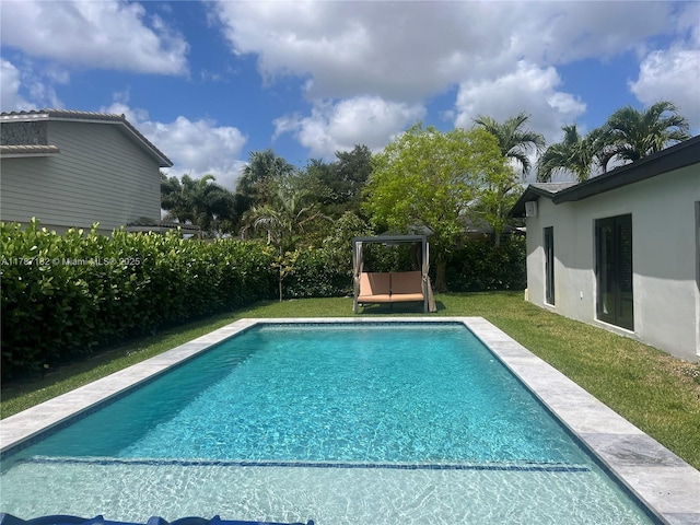 pool featuring a yard