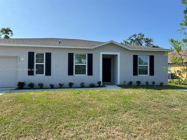 749 SE Karrigan Ter, Port St Lucie, FL 34983 - single story home featuring stucco siding, a garage, and a front lawn
