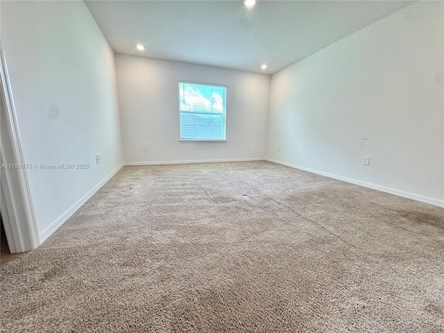 749 SE Karrigan Ter, Port St Lucie, FL 34983 - carpeted spare room with recessed lighting and baseboards