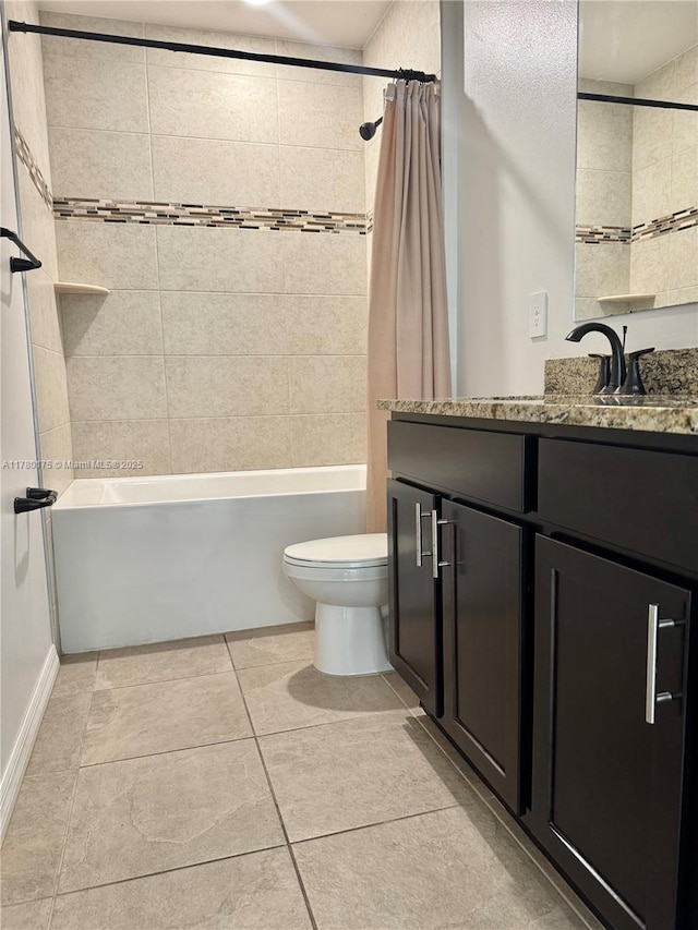 749 SE Karrigan Ter, Port St Lucie, FL 34983 - bathroom with tile patterned flooring, shower / bath combo, toilet, and vanity