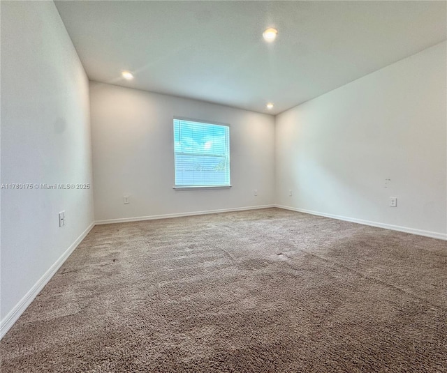749 SE Karrigan Ter, Port St Lucie, FL 34983 - carpeted empty room featuring recessed lighting and baseboards