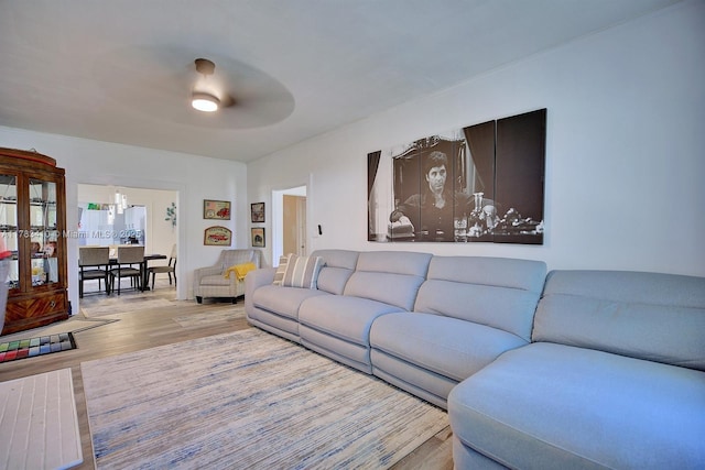 121 E Walnut St, Avon Park, FL 33825 - living area with wood finished floors and a ceiling fan