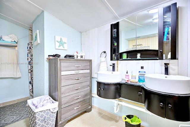 121 E Walnut St, Avon Park, FL 33825 - full bathroom with double vanity and tile patterned flooring