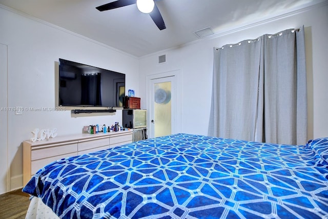 121 E Walnut St, Avon Park, FL 33825 - bedroom featuring crown molding, wood finished floors, and ceiling fan