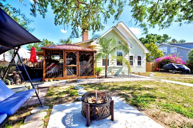 121 E Walnut St, Avon Park, FL 33825 - view of patio with a fire pit and a gazebo