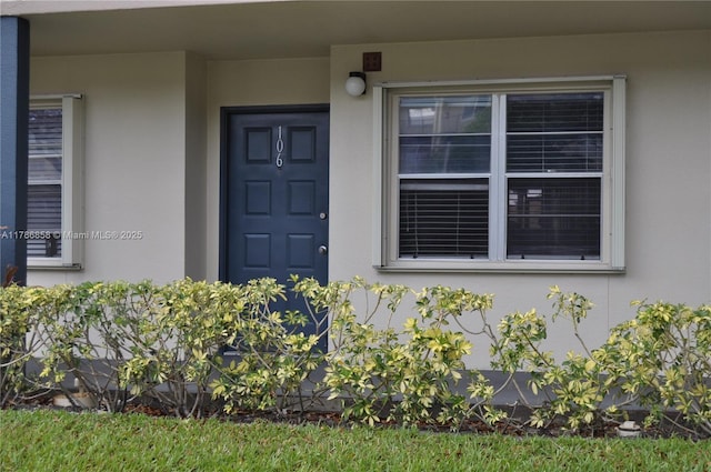 700 SW 128th Ave Unit 106C, Pembroke Pines, FL 33027 - view of exterior entry featuring stucco siding