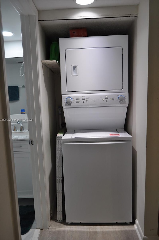 700 SW 128th Ave Unit 106C, Pembroke Pines, FL 33027 - washroom with stacked washer / drying machine