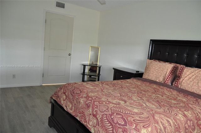 700 SW 128th Ave Unit 106C, Pembroke Pines, FL 33027 - bedroom featuring wood finished floors and baseboards