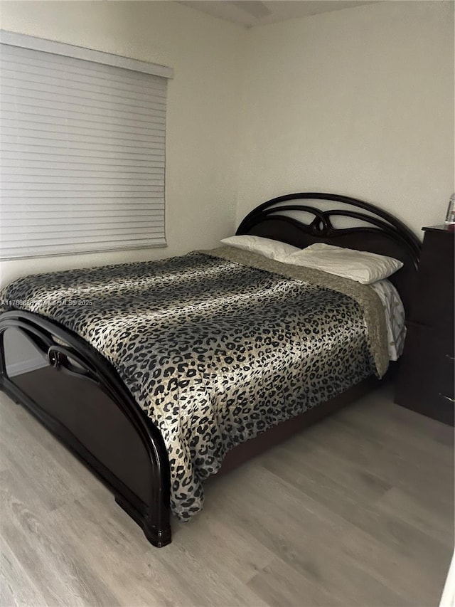 700 SW 128th Ave Unit 106C, Pembroke Pines, FL 33027 - bedroom featuring wood finished floors