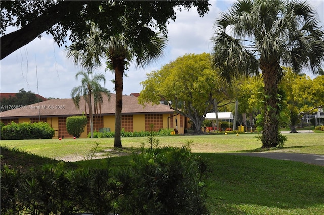 exterior space with a front yard