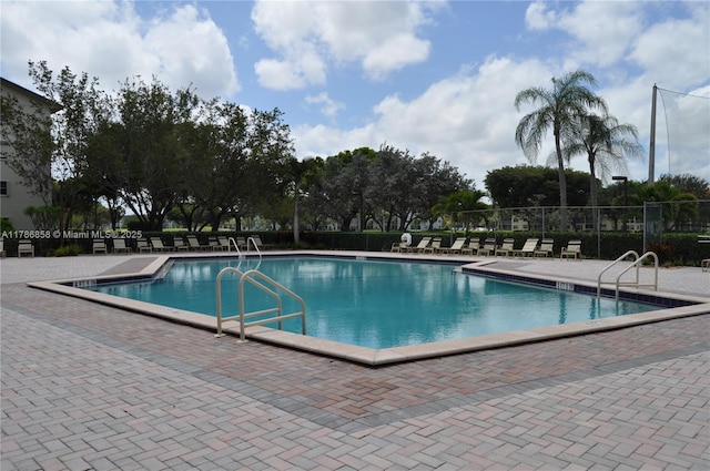 700 SW 128th Ave Unit 106C, Pembroke Pines, FL 33027 - community pool featuring a patio