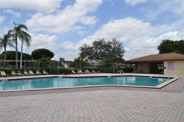 700 SW 128th Ave Unit 106C, Pembroke Pines, FL 33027 - community pool featuring a patio