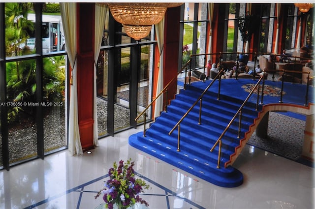 700 SW 128th Ave Unit 106C, Pembroke Pines, FL 33027 - lobby featuring floor to ceiling windows and stairway