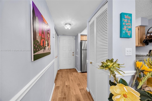 1280 S Alhambra Cir Unit 1207, Coral Gables, FL 33146 - hall with light wood-type flooring and baseboards