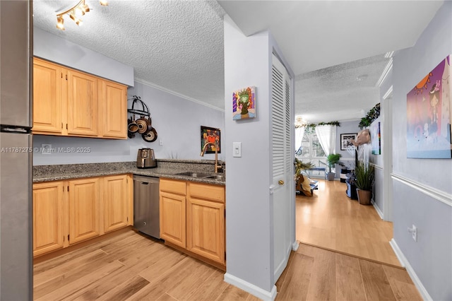 1280 S Alhambra Cir Unit 1207, Coral Gables, FL 33146 - kitchen featuring appliances with stainless steel finishes, a textured ceiling, light wood-type flooring, dark stone countertops, and ornamental molding