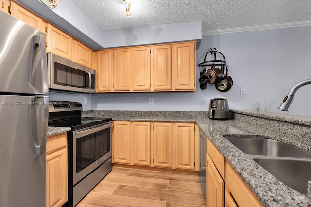 1280 S Alhambra Cir Unit 1207, Coral Gables, FL 33146 - kitchen featuring appliances with stainless steel finishes, light brown cabinets, a textured ceiling, stone countertops, and crown molding
