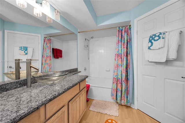 1280 S Alhambra Cir Unit 1207, Coral Gables, FL 33146 - full bathroom featuring vanity, shower / bath combo with shower curtain, and wood finished floors
