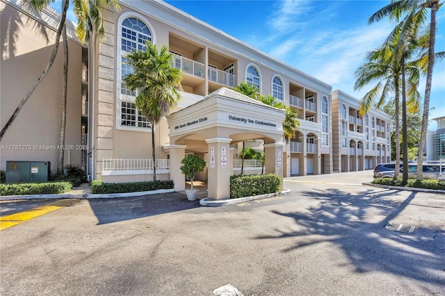 1280 S Alhambra Cir Unit 1207, Coral Gables, FL 33146 - view of property featuring uncovered parking
