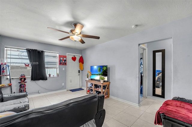 bedroom with light tile patterned flooring, baseboards, and ceiling fan