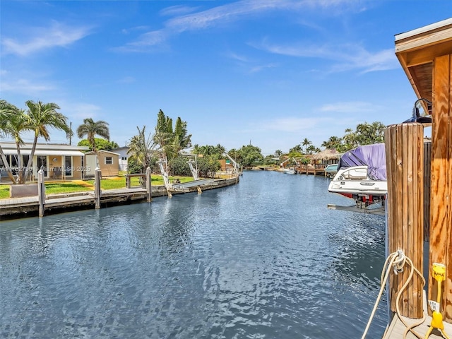 view of water feature with a dock