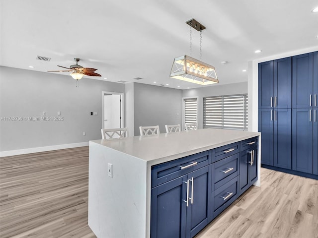 kitchen featuring recessed lighting, light wood-style floors, visible vents, and ceiling fan