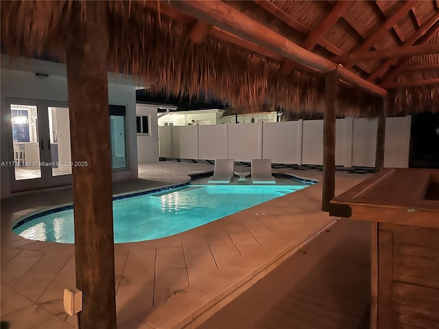 view of pool with a fenced in pool