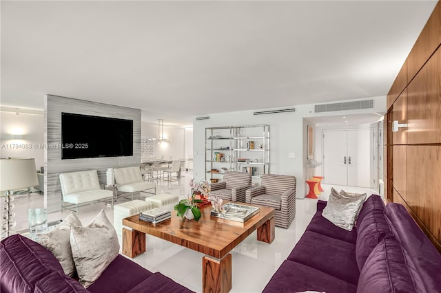 10205 Collins Ave Unit 1106, Bal Harbour, FL 33154 - living room featuring tile patterned floors