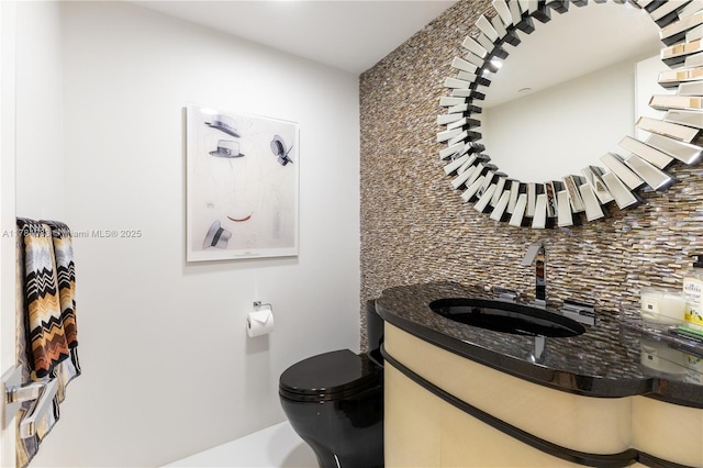 10205 Collins Ave Unit 1106, Bal Harbour, FL 33154 - bathroom with tasteful backsplash, vanity, and toilet