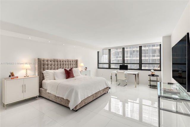 10205 Collins Ave Unit 1106, Bal Harbour, FL 33154 - bedroom with light tile patterned floors, recessed lighting, and baseboards