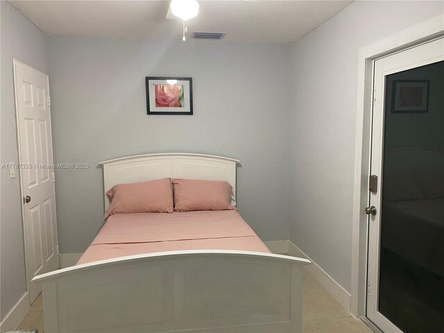 800 N 69th Ave, Hollywood, FL 33024 - bedroom with light tile patterned flooring and ceiling fan