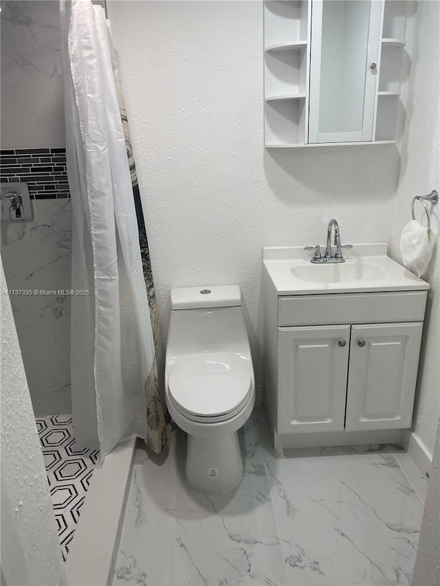 full bathroom with a shower stall, marble finish floor, toilet, vanity, and baseboards