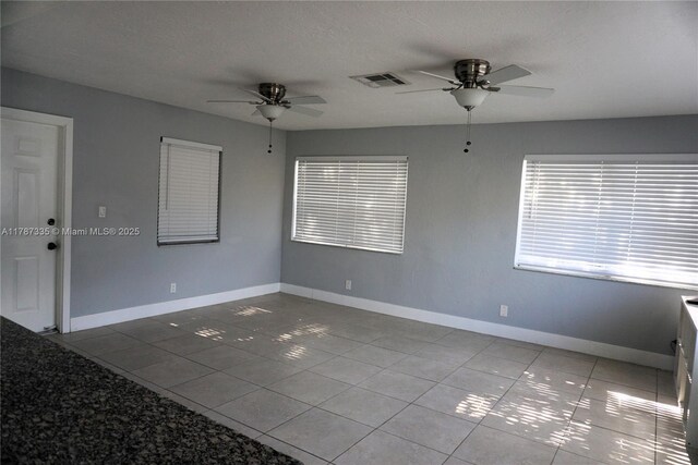 800 N 69th Ave, Hollywood, FL 33024 - unfurnished room with a ceiling fan, tile patterned floors, and baseboards