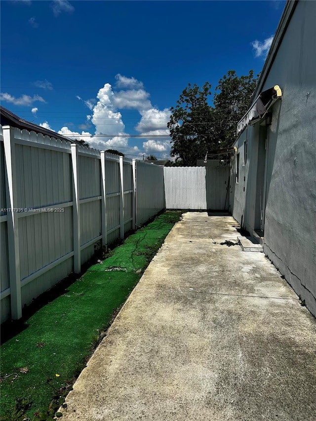800 N 69th Ave, Hollywood, FL 33024 - fenced backyard with a patio area