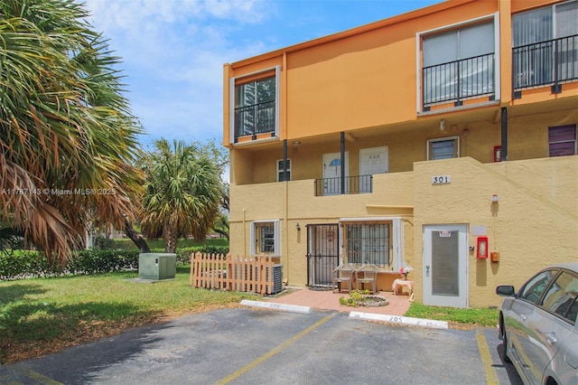 301 NW 109th Ave Unit 201, Miami, FL 33172 - view of property with uncovered parking