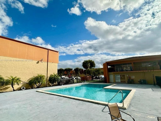301 NW 109th Ave Unit 201, Miami, FL 33172 - community pool with a patio area