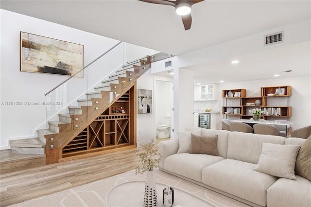 2905 Day Ave Unit 2A, Miami, FL 33133 - living room with wood finished floors, beverage cooler, ceiling fan, stairway, and recessed lighting
