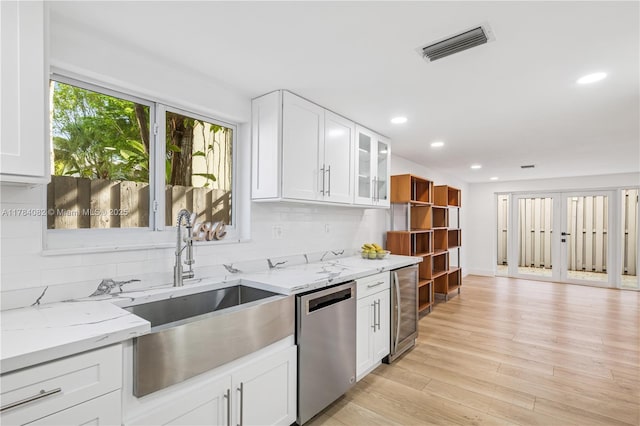 2905 Day Ave Unit 2A, Miami, FL 33133 - kitchen with stainless steel dishwasher, a sink, wine cooler, recessed lighting, and light stone counters