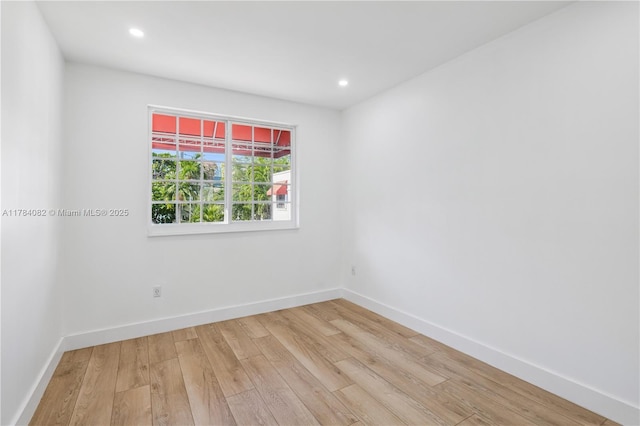 2905 Day Ave Unit 2A, Miami, FL 33133 - unfurnished room featuring light wood-type flooring, baseboards, and recessed lighting