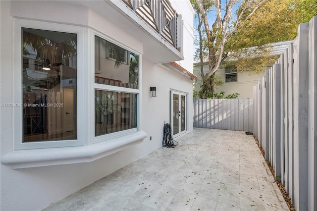 2905 Day Ave Unit 2A, Miami, FL 33133 - view of patio featuring a fenced backyard