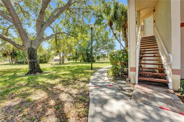 3460 N Pinewalk Dr N Unit 321, Margate, FL 33063 - view of grassy yard with stairway