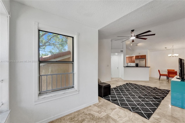3460 N Pinewalk Dr N Unit 321, Margate, FL 33063 - living room with a ceiling fan, a chandelier, and a textured ceiling