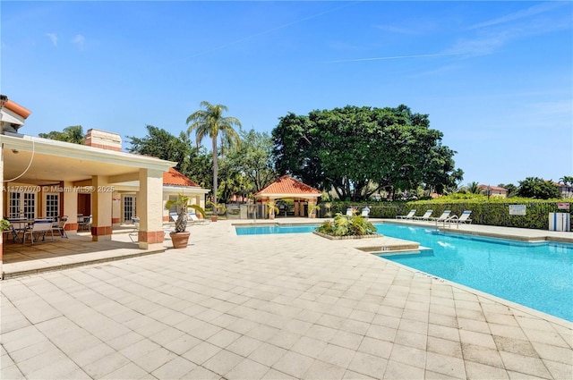 3460 N Pinewalk Dr N Unit 321, Margate, FL 33063 - community pool featuring a patio area and a gazebo