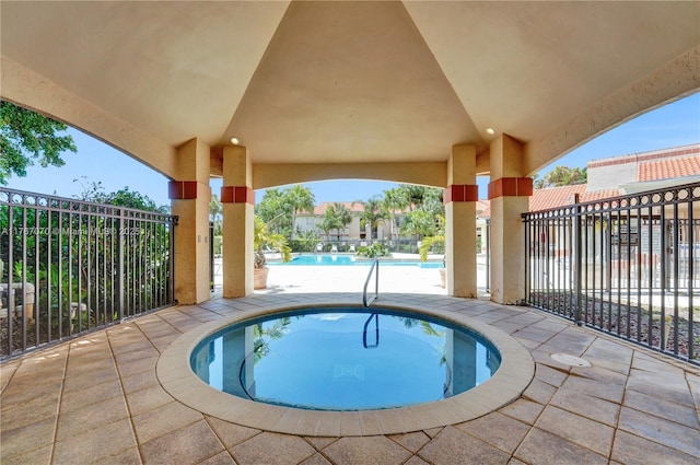 3460 N Pinewalk Dr N Unit 321, Margate, FL 33063 - community pool with a community hot tub and a patio area