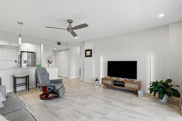 1831 NE 38th St Unit 402, Oakland Park, FL 33308 - living area with ceiling fan