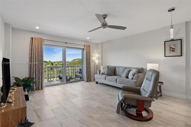 1831 NE 38th St Unit 402, Oakland Park, FL 33308 - living area with ceiling fan, recessed lighting, and baseboards