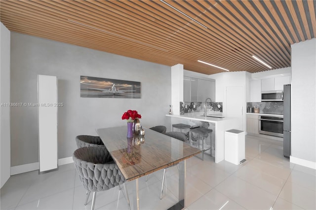 dining room with light tile patterned floors
