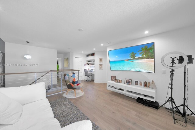 6694 NW 107th Pl, Doral, FL 33178 - living area with wood finished floors, recessed lighting, and baseboards