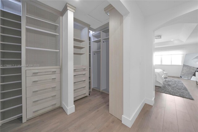 6694 NW 107th Pl, Doral, FL 33178 - spacious closet featuring wood finished floors